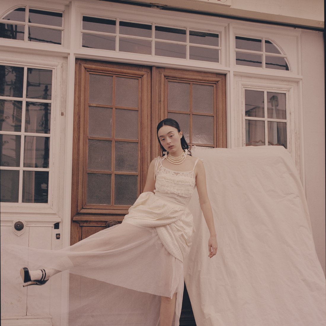 A white look in front of an antiques shopfront