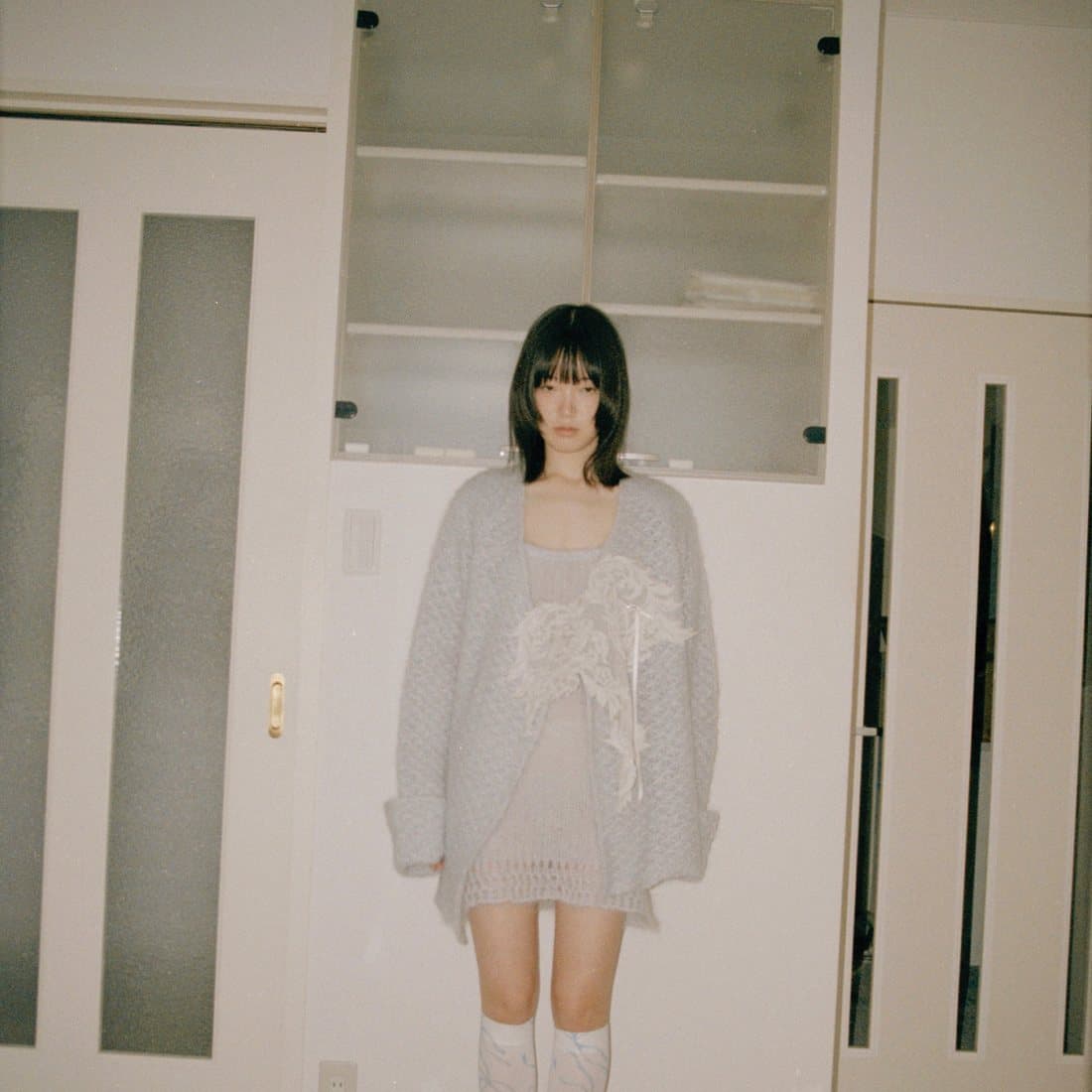 A sheer dress in a stairwell