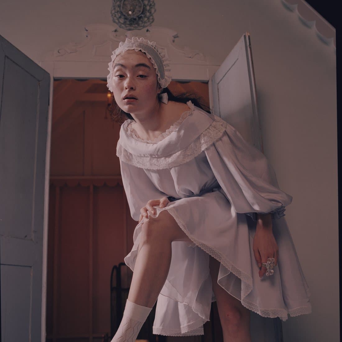 A bonnet and sheer layers